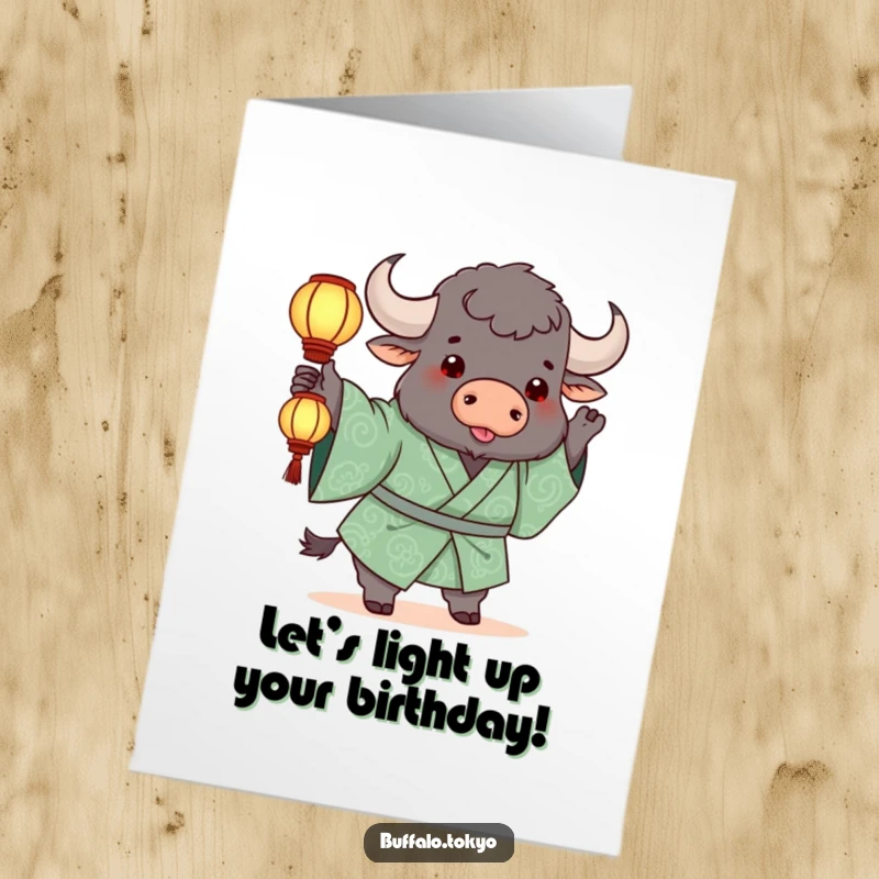 Funny Free Printable Birthday Card: a chunky buffalo in a green kimono tosses a glowing lantern playfully.